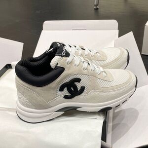 CHANEL White and Black Sneakers